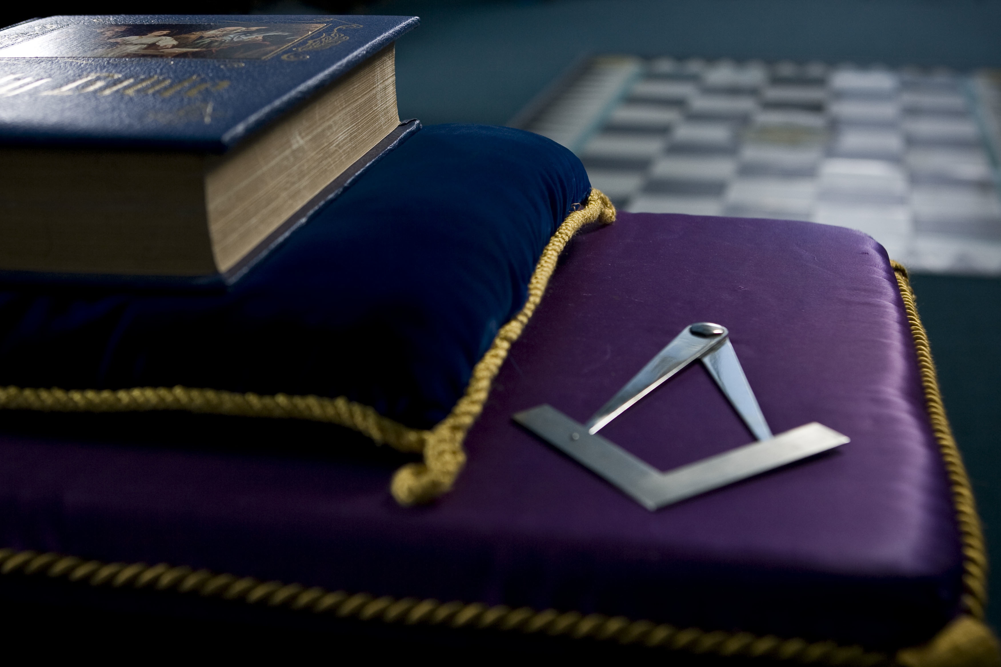 Bible, square, and compass